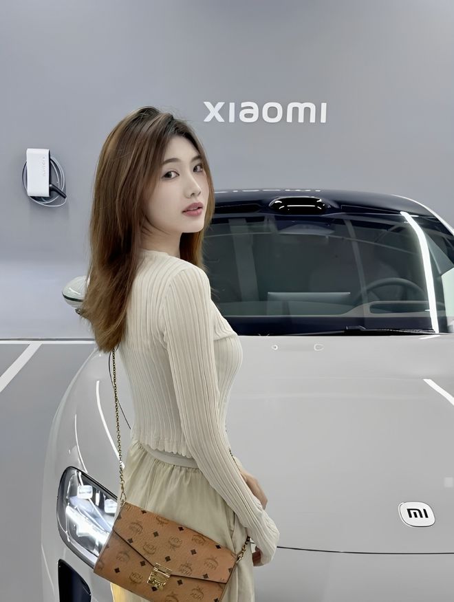 质量都这么高的吗？仙女也就长这样吧冰球突破游戏小米SU7的美女车主(图6)